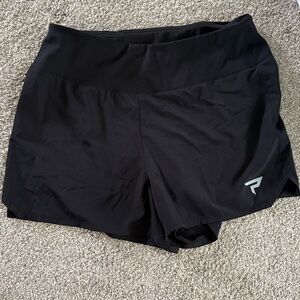 Women’s performance PADDLETEK black performance shorts large